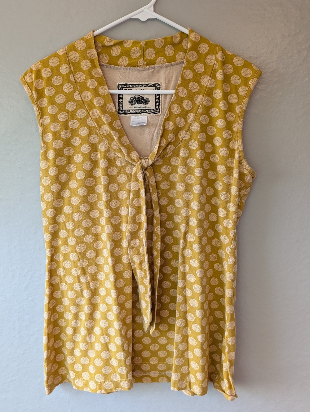 Effie's Heart Sleeveless Mustard Dot Tie-Neck Top